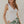 Dress Forum Sleeveless knit V-neck White bodysuit